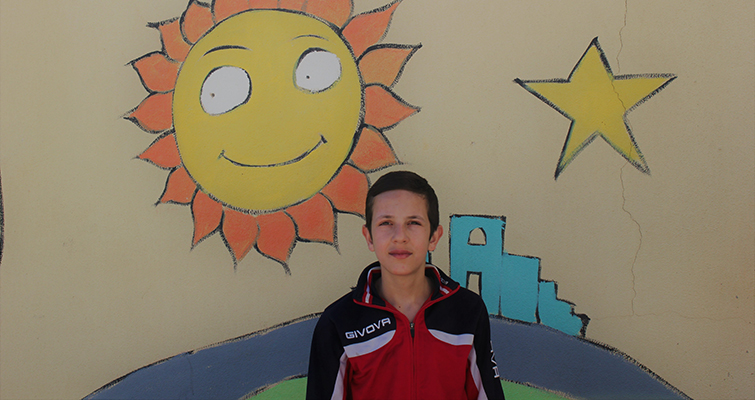 Yasser is a twelve-year-old child who had to flee Syria with his family.